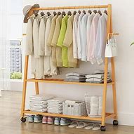 Image result for Clothes Rack On Wheels