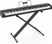 Image result for Small Portable Piano Keyboards