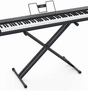Image result for Black Keyboard Piano