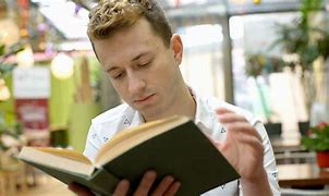 Image result for Guy Reading a Book
