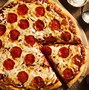 Image result for Pepperoni Pizza Cooking