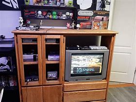 Image result for N64 in a Entertainment Center