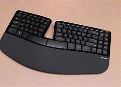 Image result for Ergonomic Curved Center Raised Keyboard