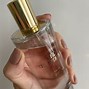 Image result for What Perfume Comes in a Red Apple Type Bottle
