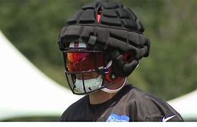 NFL to allow players to wear soft-shell helmet covers 的图像结果