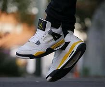 Image result for Retro 4 Tour Yellow