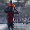 Image result for Migrants Crossing River