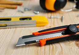Image result for Utility Knife On a Table