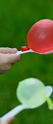 Image result for Stick Leaning On Water Balloon