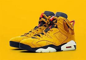 Image result for Jordan 6 Yellow Black