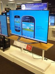 Image result for Storefront with Big Screen TV
