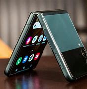 Image result for Flip Phone with 3 Cameras