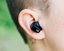 Image result for Guy with Air Pods and Beats On