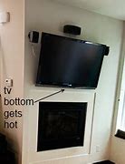 Image result for 83 Inch TV with Fireplace
