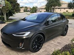 Image result for tesla x gold