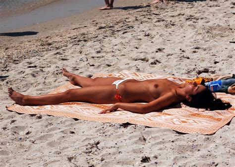 Nude Woman Sunbathing