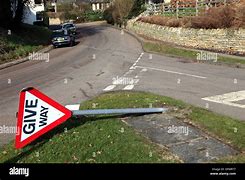 Image result for Broken Road Surface Sign