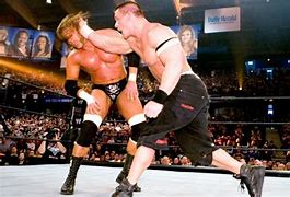 Image result for Triple H vs John Cena WrestleMania 22