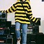 Image result for Yellow Black Sweater Artist