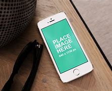 Image result for White iPhone 5 On Table