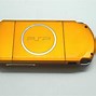 Image result for PSP 3000 Carnival Yellow