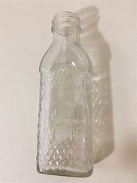 Image result for Old Bottles with a Shoe Print