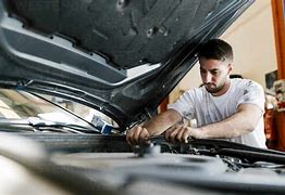 Image result for Fixing Cars