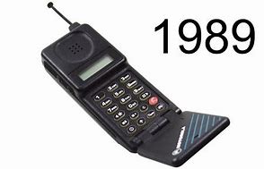 Image result for Vintage Motorola MicroTAC DPC 550 Flip Phone