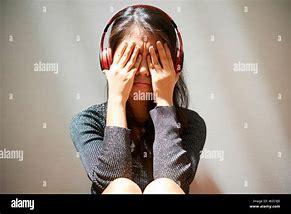 Image result for Girl with Headphones Crying