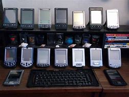 Image result for Sharp Palm Computer