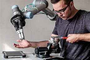 Image result for People Working On Robots
