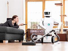 Image result for Woman Directing Robot Cleaning