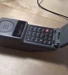 Image result for Vintage Silver Motorola Flip Phone