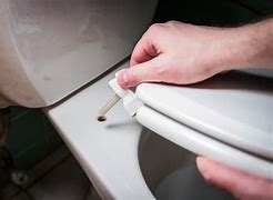 Image result for Fixing Toilet