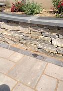 Image result for Stone Patio with Retaining Wall