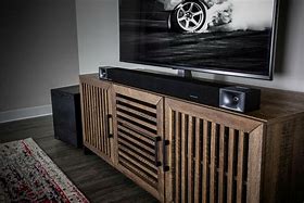 Image result for Bar with Box TV