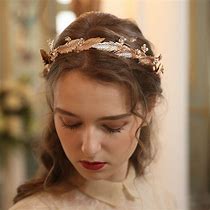 Image result for Gold Flower and Stick Headpiece