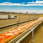 Image result for Guinness World Record for the World's Longest Pizza