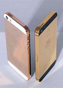 Image result for Gold iPhone 5 Red