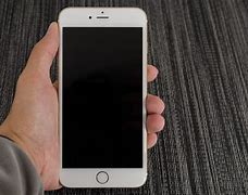 Image result for iPhone 6 Plus Size in Hand