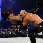 Image result for WWE Kane Chokeslam