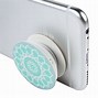 Image result for Peron Holding iPhone with Pop Socket