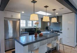 Image result for White Cabinets with Concrete Countertops