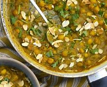 Image result for Kashmiri Curry with Banana and Almonds