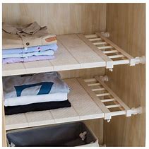 Image result for Spring Loaded Adjustable Shelves