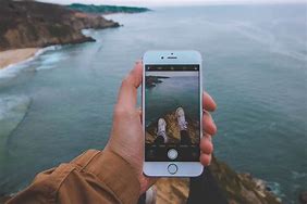Image result for Phone in Hand Wallpaper