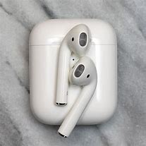 Image result for White Air Pods and Black Charger