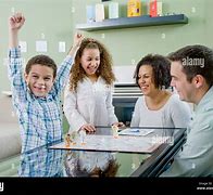 Image result for Mixed Race Parents Playing Board Game Together