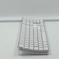 Image result for Apple Wireless Keyboard A1016 Screwdriver