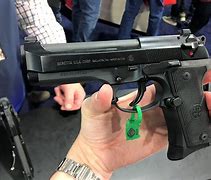Image result for Beretta 92 Tactical